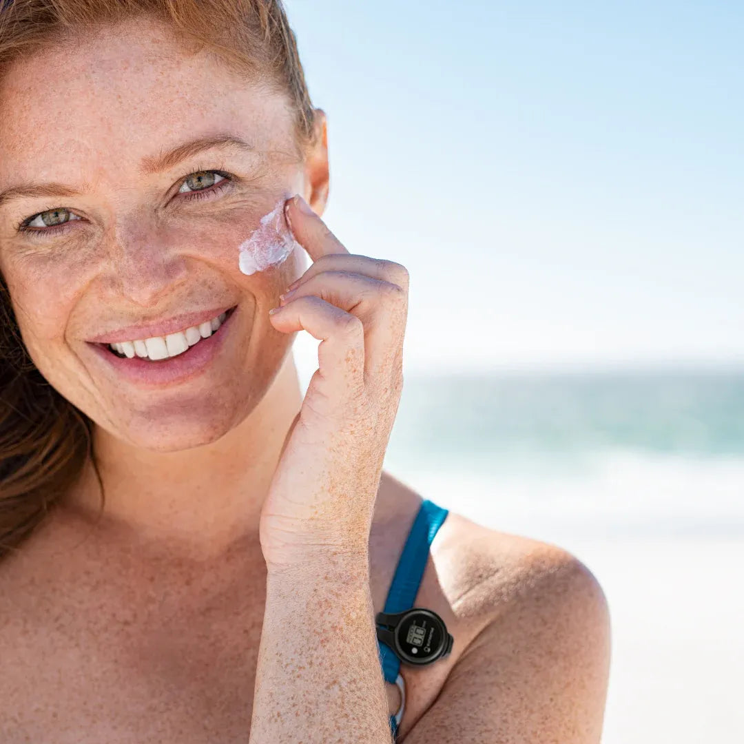 Lady using SunSense One applying sunscreen